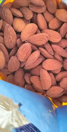Customer photo: close-up of almonds in an opened pack